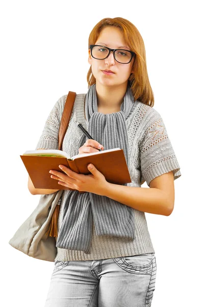 Hipster girl writing with ballpoint pen — Stock Photo, Image