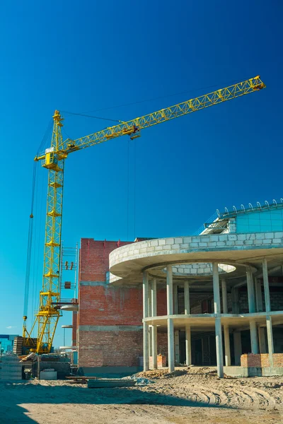 Crane in work of construction of a building — Stock Photo, Image