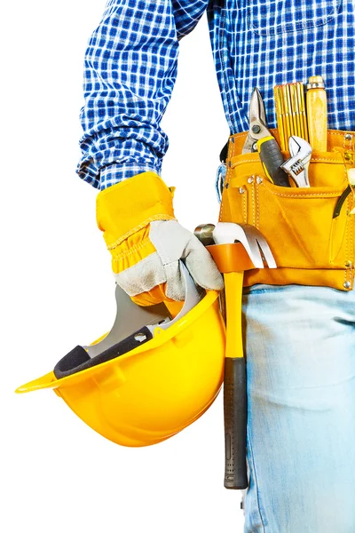 Un casco en la mano del trabajador — Foto de Stock