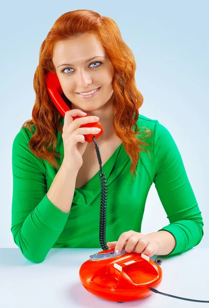 A redhead female fith telephone — Stock Photo, Image