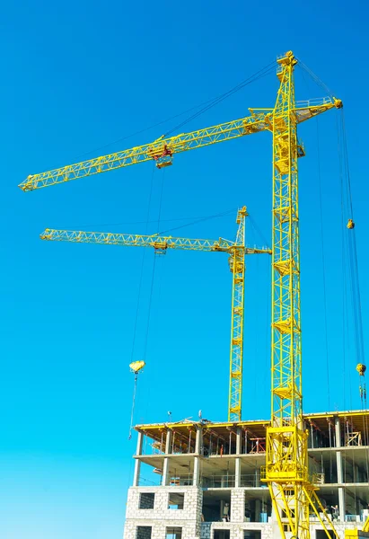 Construction cranes in work — Stock Photo, Image