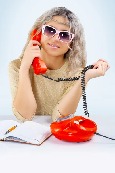 A young blonde with telephone — Stock Photo, Image