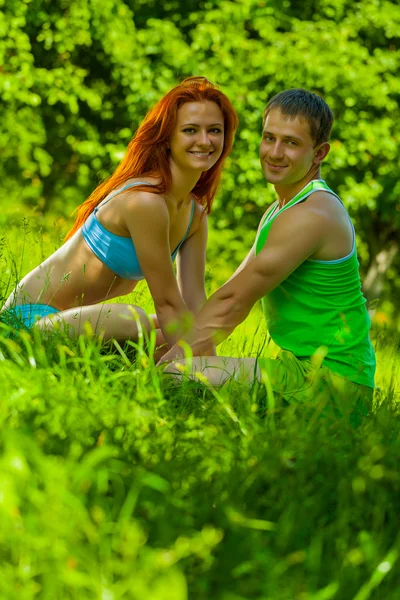 A smiling sports couple — Stock Photo, Image