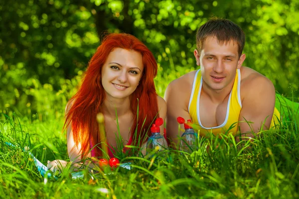 Couple of sports man and girl — Stock Photo, Image