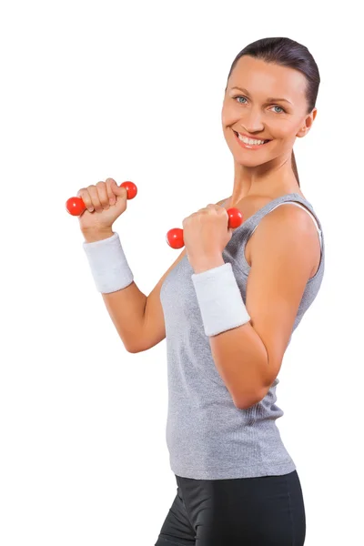 A sports female lifting weights isolated — Stock Photo, Image