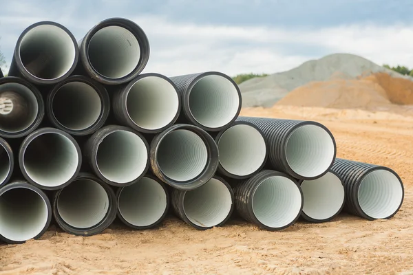 Stack of ribbed pipes — Stock Photo, Image