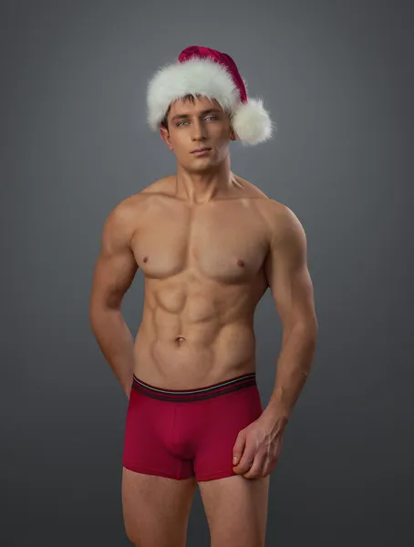 Homme nu en bonnet de Père Noël — Photo