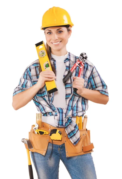 Bela trabalhadora segurando ferramentas — Fotografia de Stock