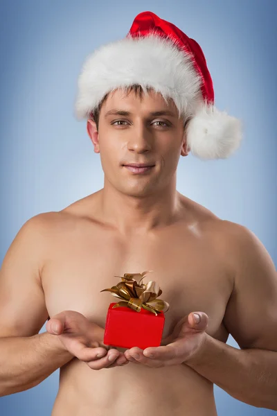 Portrait of muscular men in santa cap — Stock Photo, Image