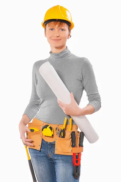 Female worker holding big blueprint — Stock Photo, Image