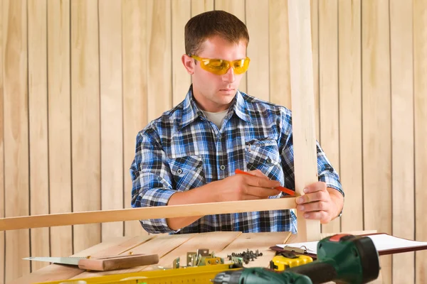 Carpenter is working Stock Image