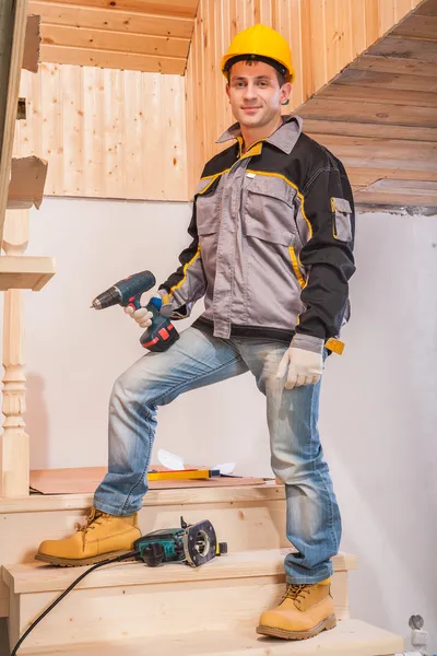 Contractor  holding cordless drill — Stock Photo, Image