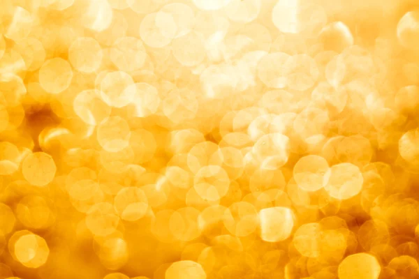 Golden glowing bokeh — Stock Photo, Image