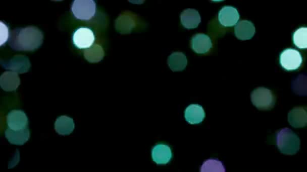 Video 1080p - verschwommenes blaues, grünes und violettes Licht und Funkeln - loopbarer abstrakter Hintergrund — Stockvideo