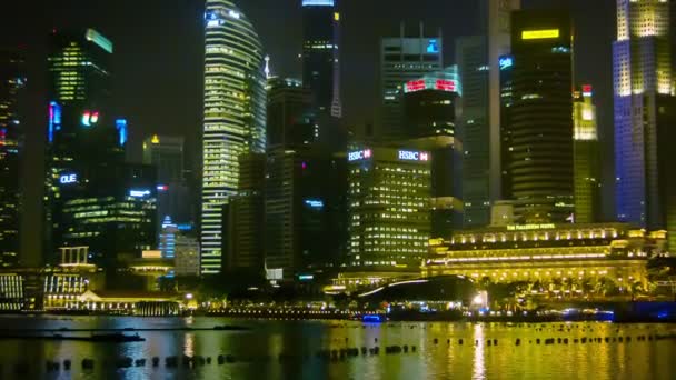 Singapore - jan 01 2014: wolkenkrabbers van het centrale gebied op de baai. Zoom schot — Stockvideo