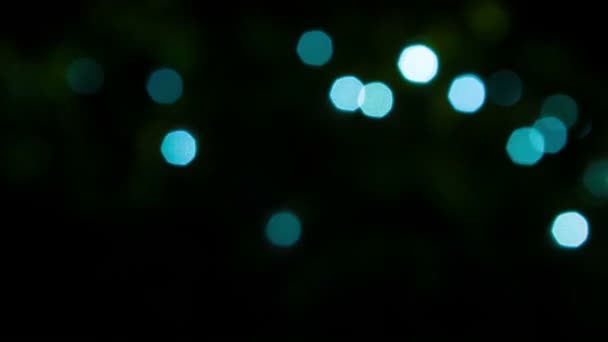 Video 1080p - Sparkling blue lights on a black background — Stock Video