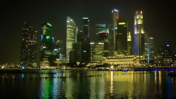 Singapore - circa jan 2014: natt syn på höghus kontorsbyggnad — Stockvideo