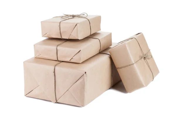 Boxes wrapped with brown kraft paper isolated on white backgroun — Stock Photo, Image