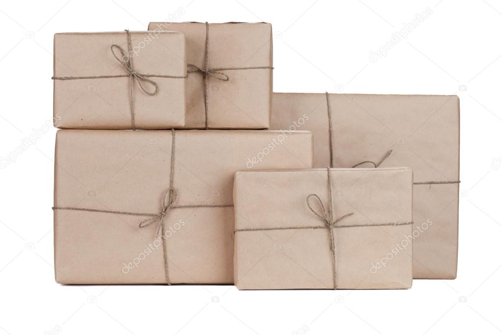 Stacking parcels boxes with kraft paper, isolated on white