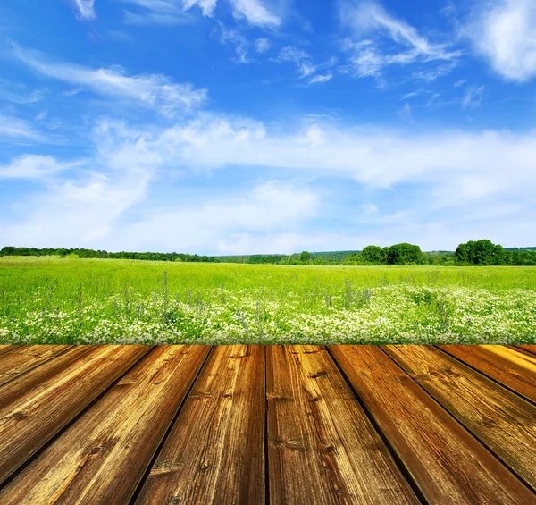 Blue sky and wood floor background — Stock Photo, Image