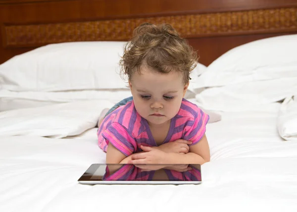 Baby with touch pad — Stock Photo, Image