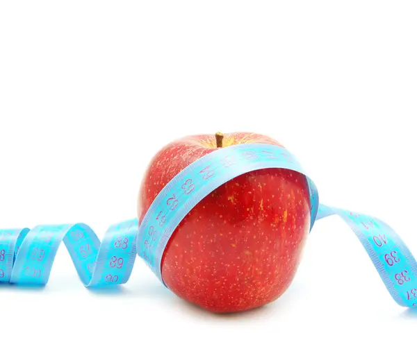 Apple and measuring tape — Stock Photo, Image