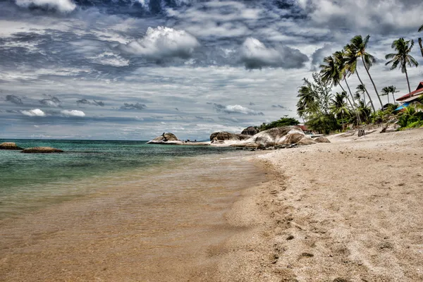 Beach and tropical sea — Stock Photo, Image