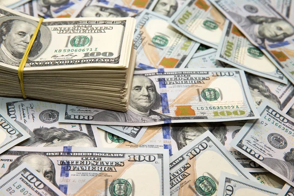 Dollars arranged at the background — Stock Photo, Image