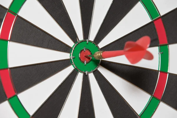 Red dart in bullseye — Stock Photo, Image