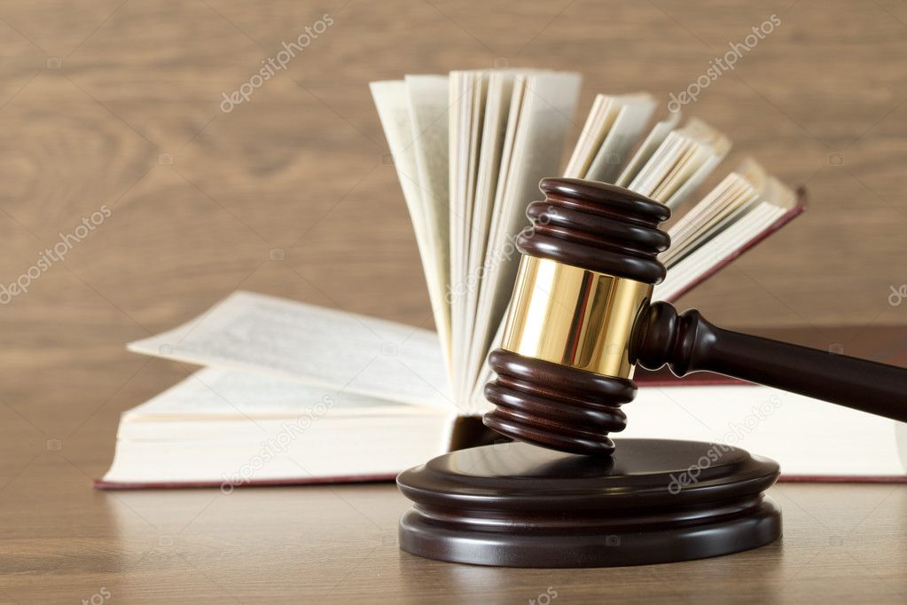 wooden gavel and books 