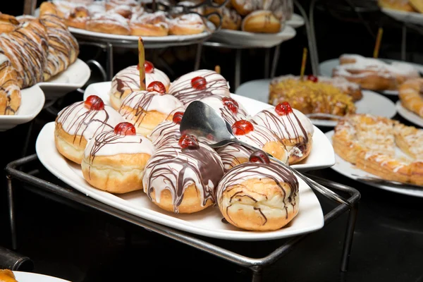 Cakes on plates — Stock Photo, Image