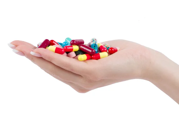 Mão segura pílula — Fotografia de Stock