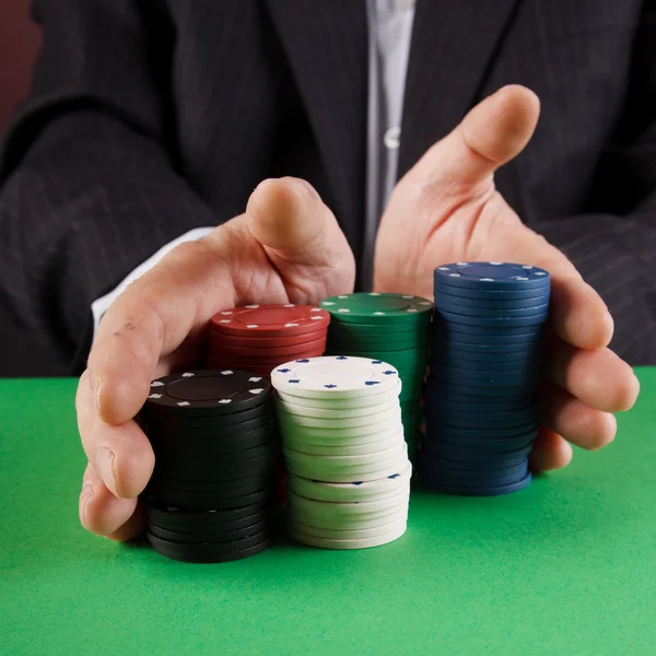 Businessman playing poker — Stock Photo, Image