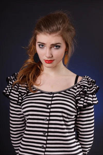 Mooi meisje in een striped blouse — Stockfoto