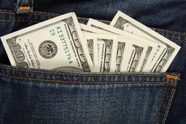 Dolar v džínách kapsy. — Stock fotografie