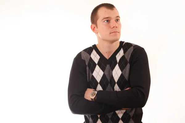 Guapo joven hombre de negocios de pie sobre fondo blanco — Foto de Stock