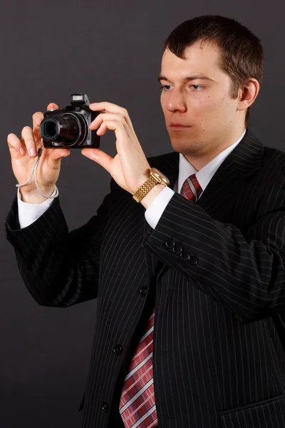 Man met een camera — Stockfoto