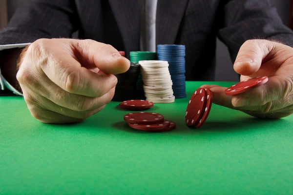 Businessman playing poker — Stock Photo, Image