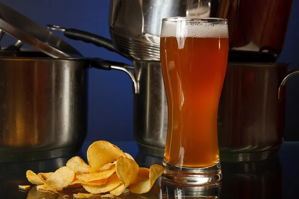 A glass of beer in the kitchen — Stock Photo, Image