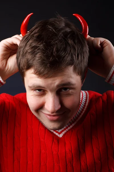 Guy with the horns of the pepper — Stock Photo, Image