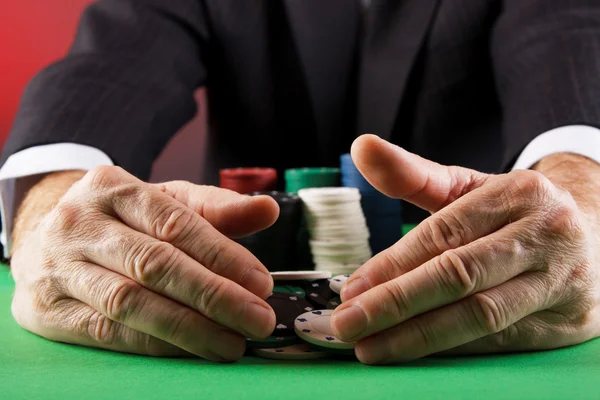 Businessman playing poker — Stock Photo, Image