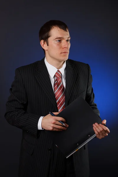Closeup of a business man holding folder — Stock Photo, Image