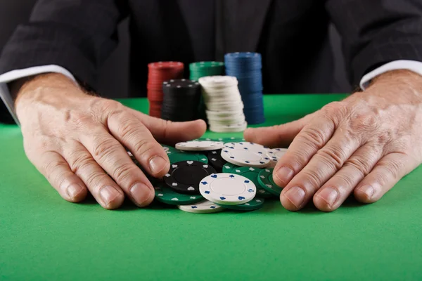 Businessman playing poker — Stock Photo, Image