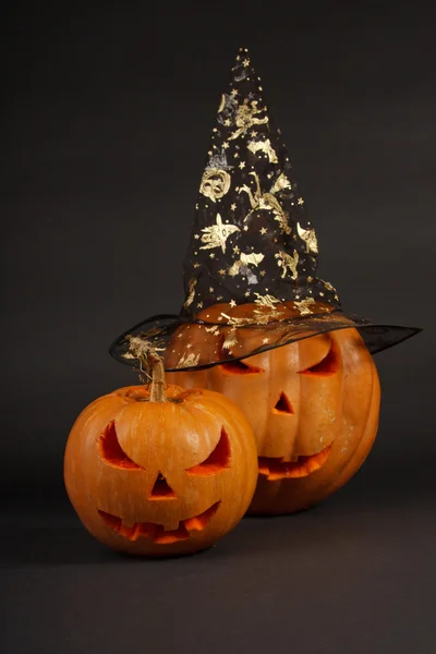 Orange halloween pumpkin on dark blue background Stock Picture