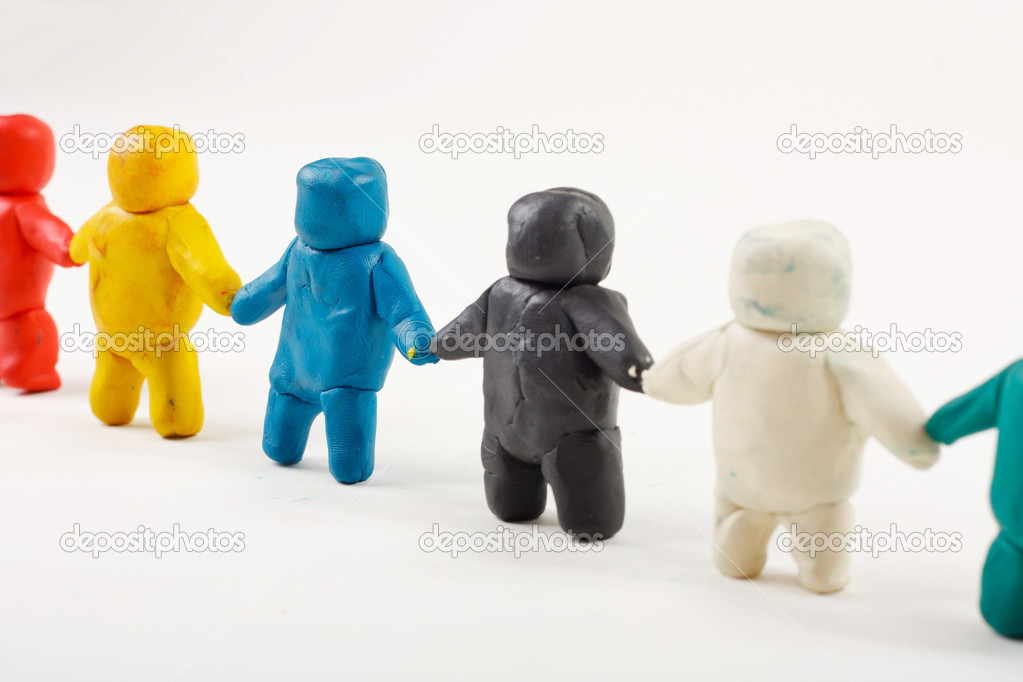 Plasticine little men stand in a row