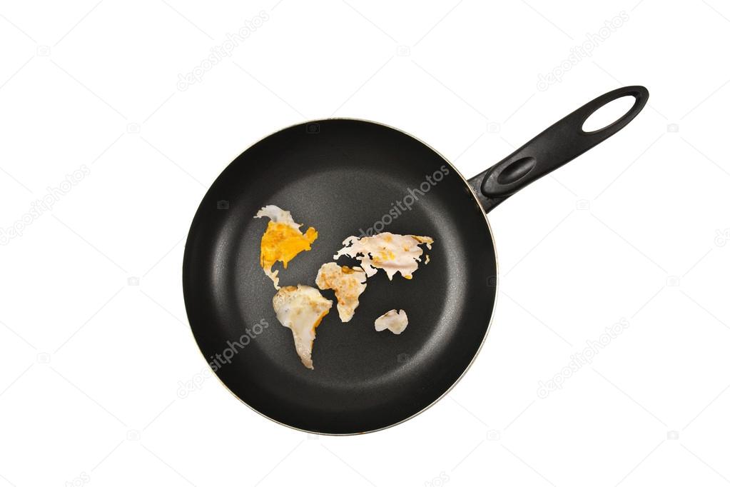 Fried eggs on a frying pan in the form of continents. White background.