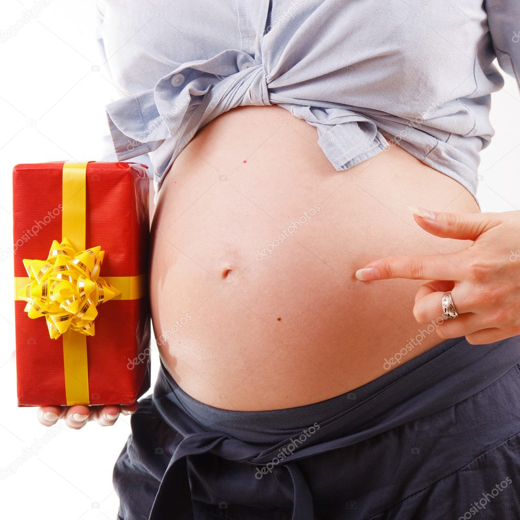 Pregnant woman with a present