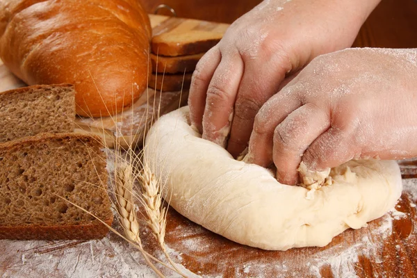 Bread on wood table — Stock Photo, Image