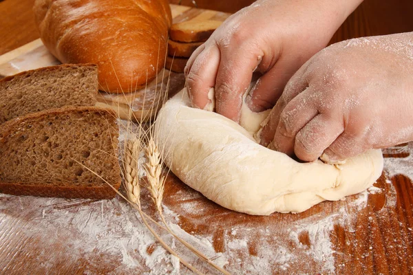 Bread on wood table — Stock Photo, Image