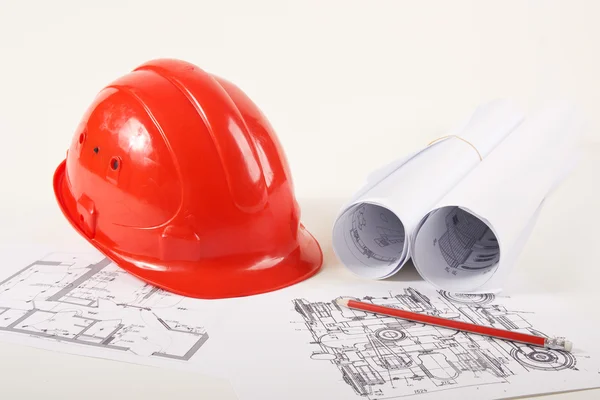 Hardhat on blueprint — Stock Photo, Image